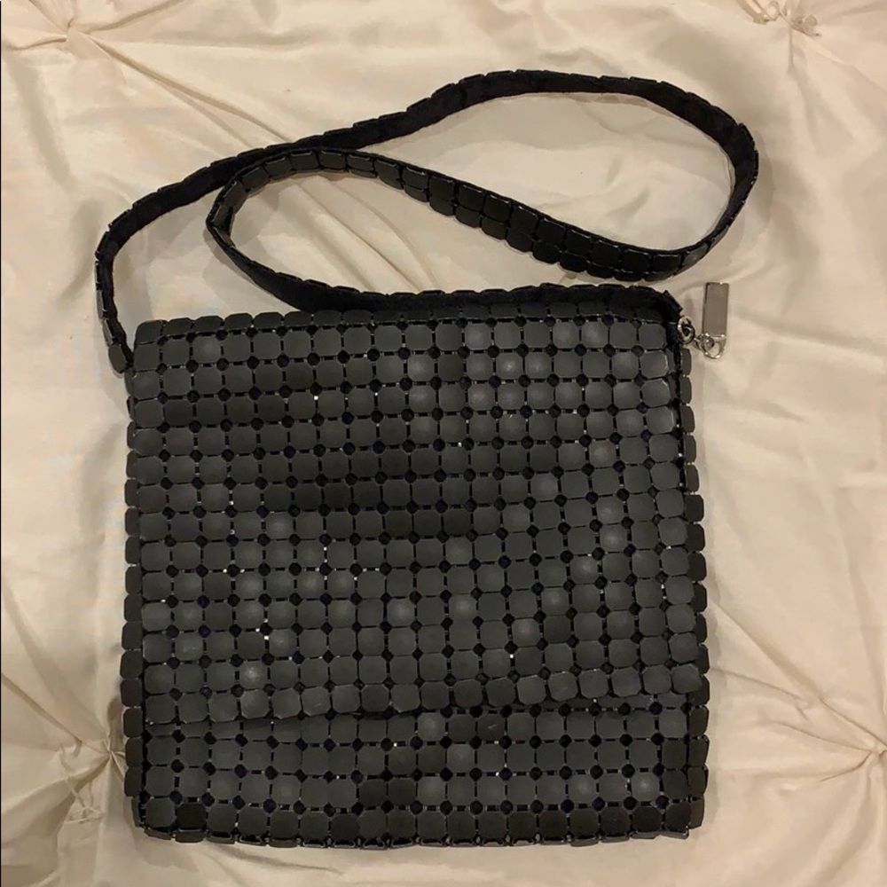 Black crossbody square-link chain bag.